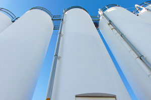 tall repainted industrial storage silos in Kitchener