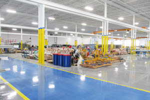 industrial painting in a Toronto factory showing ceilings, beams, epoxy floors