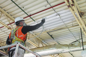 spray painting of a factory ceiling by a Mississauga painting contractor