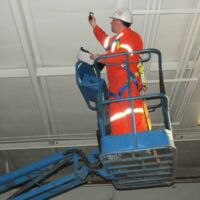 estimator preparing a cost / price quote for ceiling painting