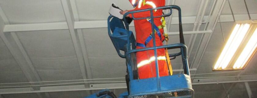 estimator preparing a cost / price quote for ceiling painting