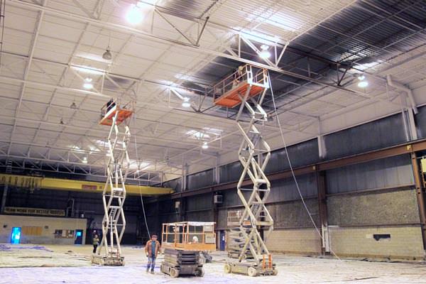 spray painting a metal deck ceiling